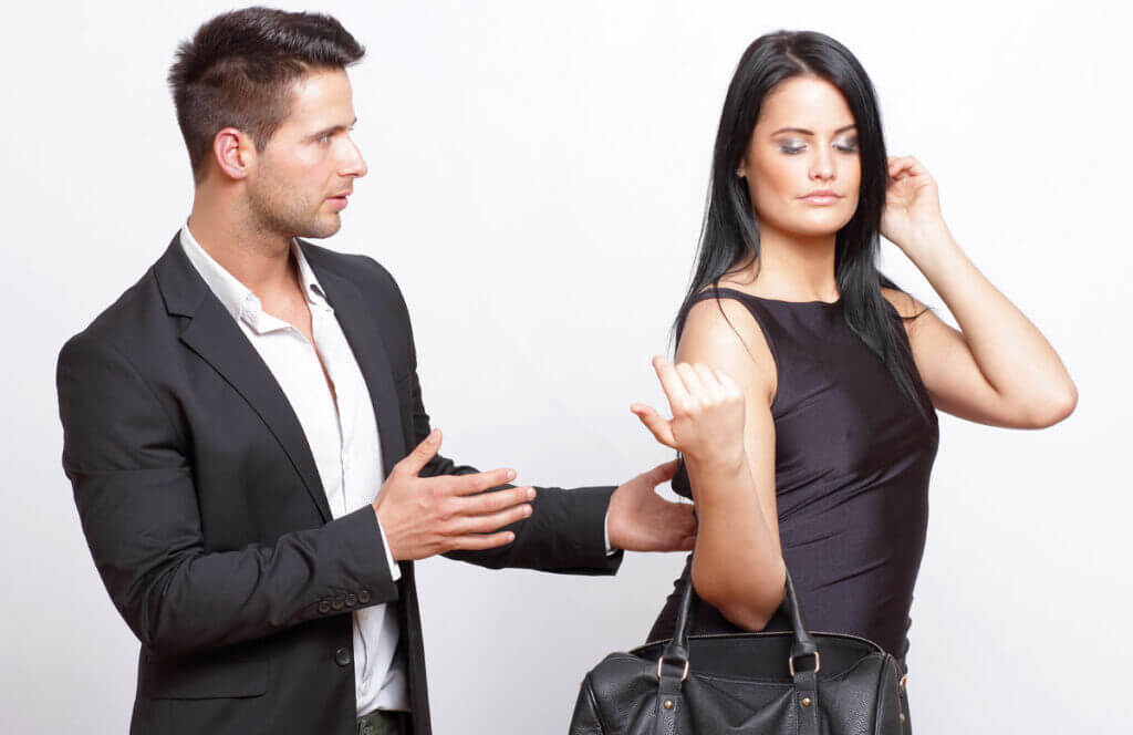 What Do Women Really Want? Women Wearing Purse Walking Away From Guy In Suit